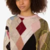 Sweter z moheru z wstawkami z gazy